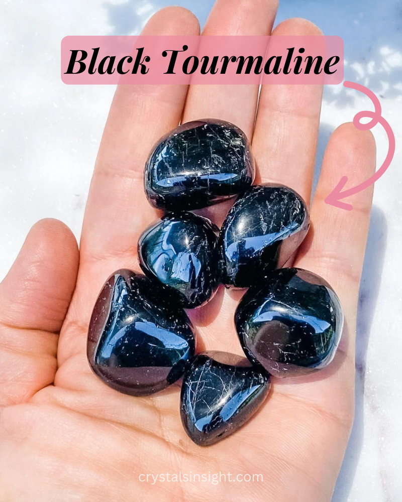 Black Tourmaline stone look like sleek and dark, like a protective shield in hand of man 